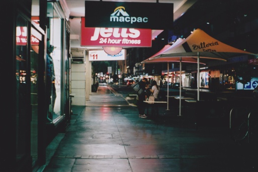 Adelaide-Night-Street-Photography---Highstreet-Couple-Pavement-Glowing-Signs